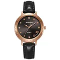 Close-up of rose gold watch case with rhinestone hour markers and black leather strap - Black