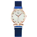 Detail of rose gold quartz watch with white flower petal dial and blue mesh strap - Blue Strap White Dial Watch Only