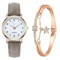 Dettaglio dell'orologio oro rosa con cinturino in pelle grigia e bracciale con stella - Orologio Grigio + Bracciale