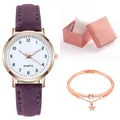 Dettaglio dell'orologio in pelle viola e bracciale a stella oro rosa in confezione regalo - Viola + Bracciale + Scatola