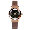 Detail of rose gold Milanese mesh band and starry sky dial with Roman numerals - Watch Only / Coffee
