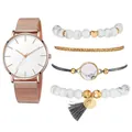 Détail de la montre à maille milanaise or rose et du set de bracelets en marbre - Bracelet Or Rose Cadran Blanc Et Bracelets