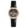 Macro detail of rhinestones bezel and hollow star design on quartz watch dial - Watch Only / Black