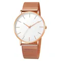 Vue détaillée d'une montre femme minimaliste or rose avec bracelet en maille - Bracelet Or Rose Cadran Blanc Montre Seule