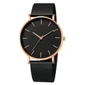 Gros plan d'une montre à maille noire avec boîtier or rose et ensemble de bracelets - Bracelet Noir Boîtier Or Rose Cadran Noir Montre Seule