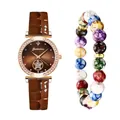Close-up of quartz watch with rhinestone bezel and colorful beaded bracelet accessory - Brown Watch And Bracelet