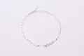 Bracciale asimmetrico in argento sterling S925 con maglie rettangolari e chiusura a moschettone - Argento