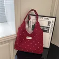 Burgundy floral canvas tote bag with Creative Cat label and spacious interior design - Red