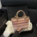 Handwoven tri-color striped straw bag with leather knot handles in a luxury gift box - Khaki