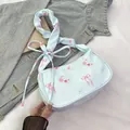 Floral canvas underarm bag in light blue with pink rose patterns and bow shoulder strap - Blue