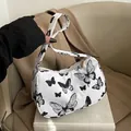 White underarm bag with black butterfly print featuring metal zipper and wide strap - White Butterfly Style