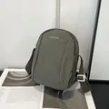 Borsa a tracolla in nylon verde oliva con ricamo LANWEIER su tessuto strutturato - Verde