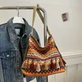 Sac à bandoulière bohème tissé avec motifs géométriques et franges colorées - Orange