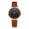 Detail of rose gold quartz watch with black dial and textured brown leather strap - Brown Single Watch