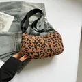 Leopard print corduroy crossbody bag with adjustable strap and vintage crescent shape - Brown