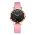 Macro detail of minimalist rose gold watch with black dial and pink leather strap - Pink Watch Only