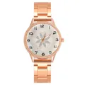Close-up of rose gold watch with floral pattern dial and Arabic numeral markers - Watch Only / White