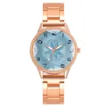 Detail of rose gold watch band with a floral patterned light blue dial and numeric markers - Watch Only / Blue