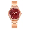 Detail of rose gold quartz watch featuring a red sunray dial with petal texture - Watch Only / Red