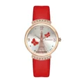 Detail of rose gold watch case featuring Eiffel Tower relief and red butterfly accents - Red Watch Only