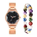 Close-up of rose gold watch with black floral dial and colorful beaded stretch bracelet - Watch And Bracelet / Black