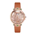 Close-up of mother-of-pearl watch dial with diamond deer and colorful gemstones - Orange Watch Only