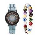 Detail of blue faux crocodile leather watch band and matching marbled beaded bracelet - Wristwatch And Colored Beaded Bracelet / Blue