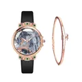 Detail of rose gold watch with deer dial, colorful crystals and matching star bracelet - Black + Bracelet