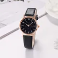 Women's quartz watch with black starry sky dial and rose gold case on leather strap - Black