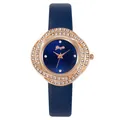 Detailed macro view of crystal-encrusted rose gold bezel and navy blue leather strap watch - Watch Only / Blue