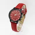 Minimalist quartz watch with vibrant red leather strap and black case on white background - Burgundy