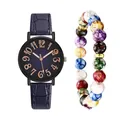 Detail of vintage ladies watch with navy crocodile leather strap and colorful bead bracelet - Wristwatch And Colored Beaded Bracelet / Navy Blue
