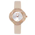 Detail shot of a rose gold watch with a sparkling rhinestone bezel and beige leather strap - Watch Only / White