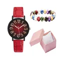 Close-up of red crocodile strap watch and stone bead bracelet in a pink gift box - Wristwatch And Beaded Bracelet And Gift Packaging / Red