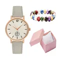 Detail of quartz watch with matte strap and beaded bracelet in a pink gift box - Grey Watch + Bracelet + Box