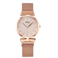 Detail of rose gold ladies watch featuring a textured leaf dial and milanese mesh strap - Gold