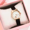 Detailed view of the rose gold cat-ear watch with leather strap in a pink gift box - Black Watch Only