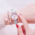 Light blue women's watch with cat ear case and matching floral beaded bracelet - Light Blue