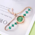 Elegant rose gold watch with green dial and leaf accents on a chic pull-cord strap - Green