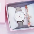 Close-up of rose gold watch and sparkling star bracelet in a pink gift box set - Gray Watch + Bracelet + Box