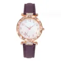 Detail of rose gold quartz watch with crystal bezel and purple leather strap - Purple