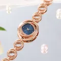 Elegant rose gold hollow bracelet watch with navy blue dial and crystal markers - Rose Gold Case Blue Dial