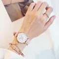 Detail of pink fashion watch set with heart dial and matching rose gold bracelets - Pink Watch + Bracelet