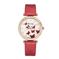 Detailed view of rose gold quartz watch featuring red butterfly patterns and leather strap - Red
