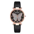 Close-up of rose gold watch dial with silver glitter butterfly and black leather strap - Watch Only / Black