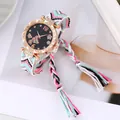 Detail of bohemian woven strap watch with butterfly dial and rose gold petal bezel - White Black Pink Green Multicolor