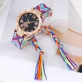 Detail of rose gold butterfly watch dial with a colorful bohemian woven tassel strap - Blue Purple Yellow Multicolor