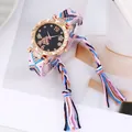 Bohemian style women's watch featuring a woven strap with colorful tassels and butterfly dial - Pink Blue White Multicolor
