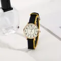 Detail of round gold quartz watch with striped nylon strap and Arabic numeral dial - Black