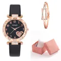 Detailed view of women's black leather watch with heart pattern and rose gold bracelet - Watch And Bracelet Gift Box / Black